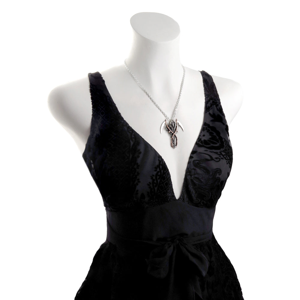 The Grim Reaper Double Scythe Pendant on mannequin