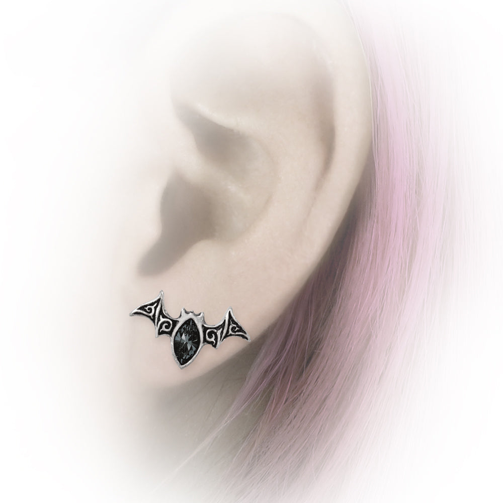 Black Diamond Bat Ear Studs on a ear