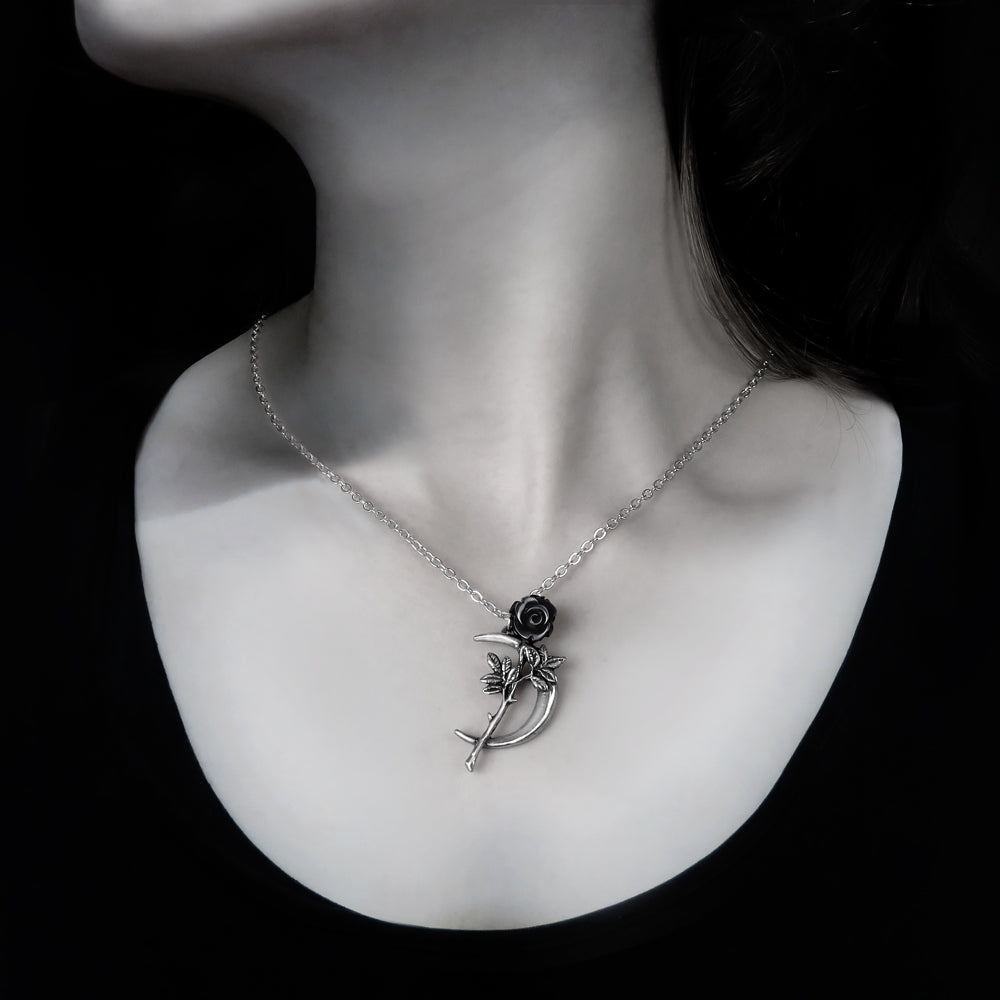 Crescent Moon And Rose Necklace on a woman