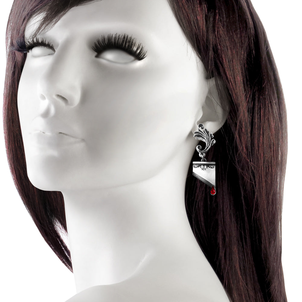 Guillotine Blades Earrings on a mannequin 