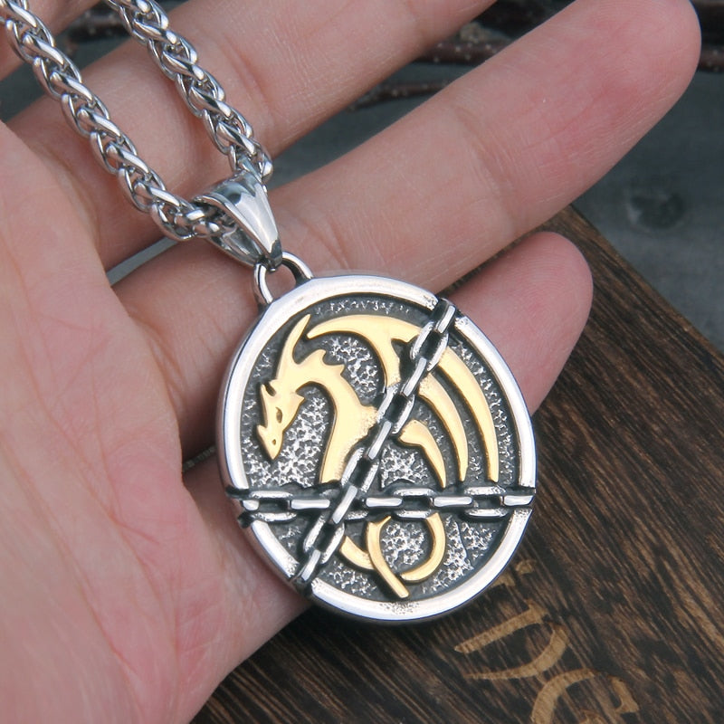 Chained Dragon Pendant on a hand