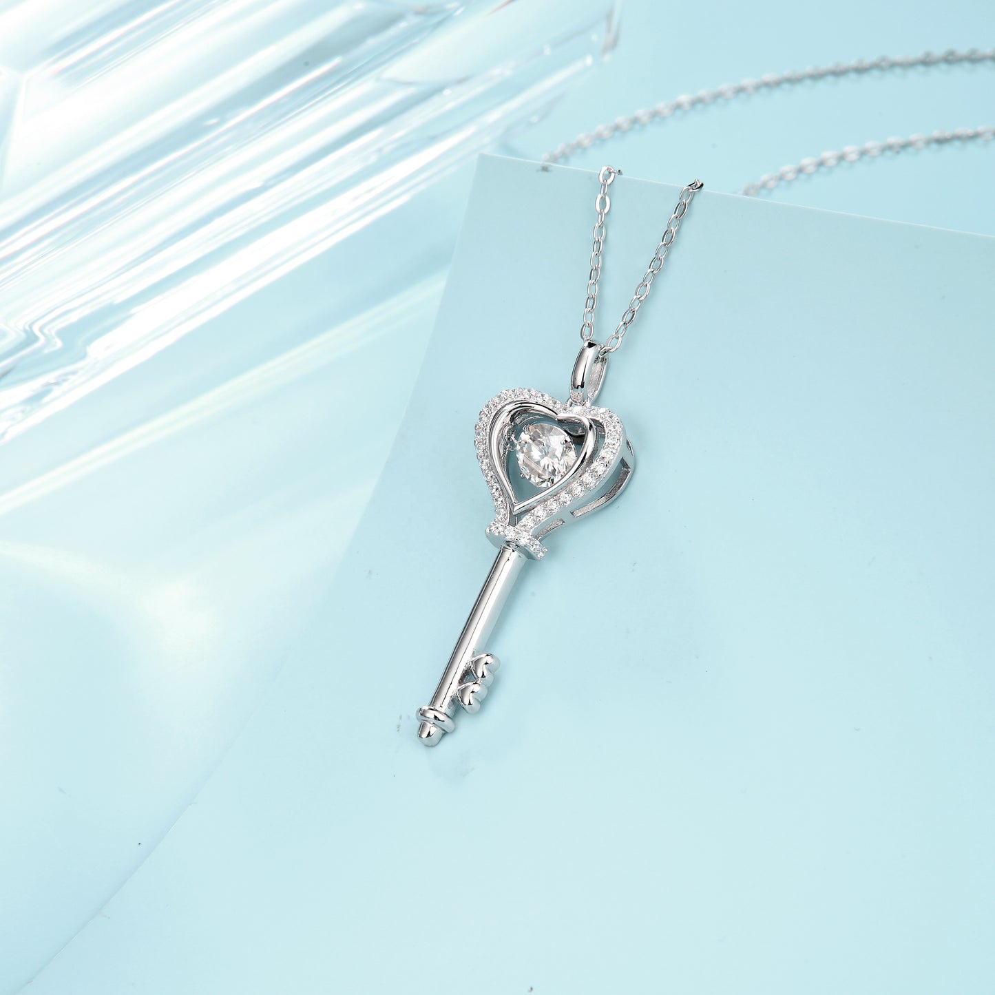 Key And Stone Pendant With A Moissanite Diamond side view