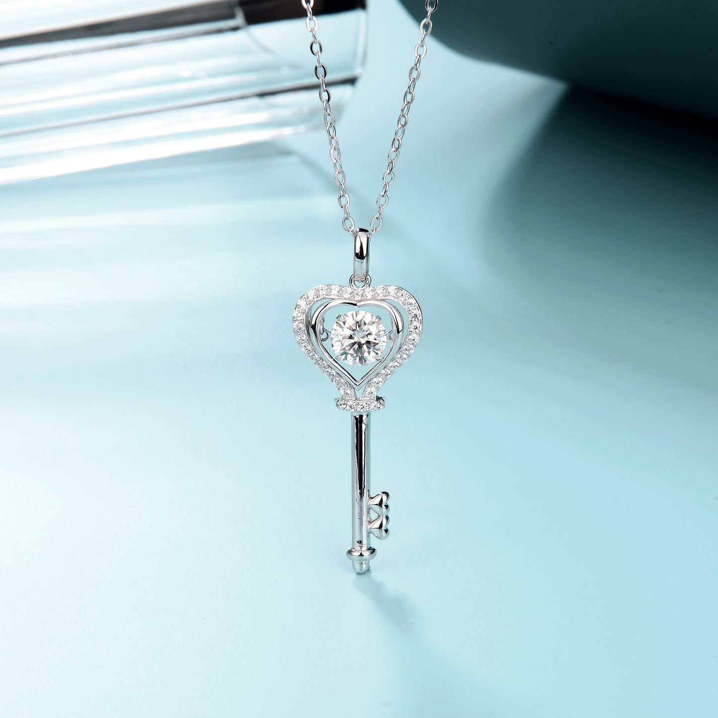 Key And Stone Pendant With A Moissanite Diamond front view