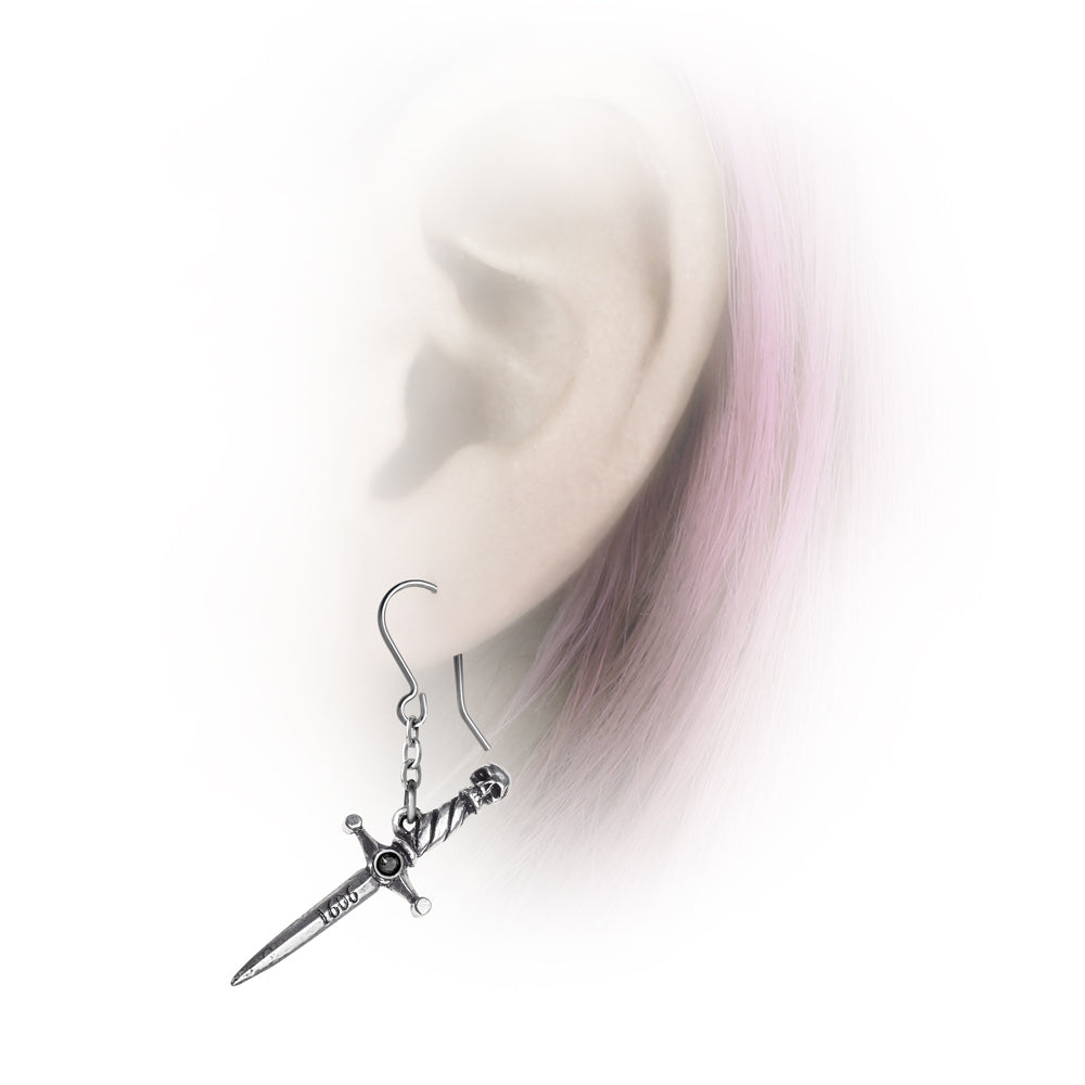 Skull Macbeth Dagger Earrings on a ear